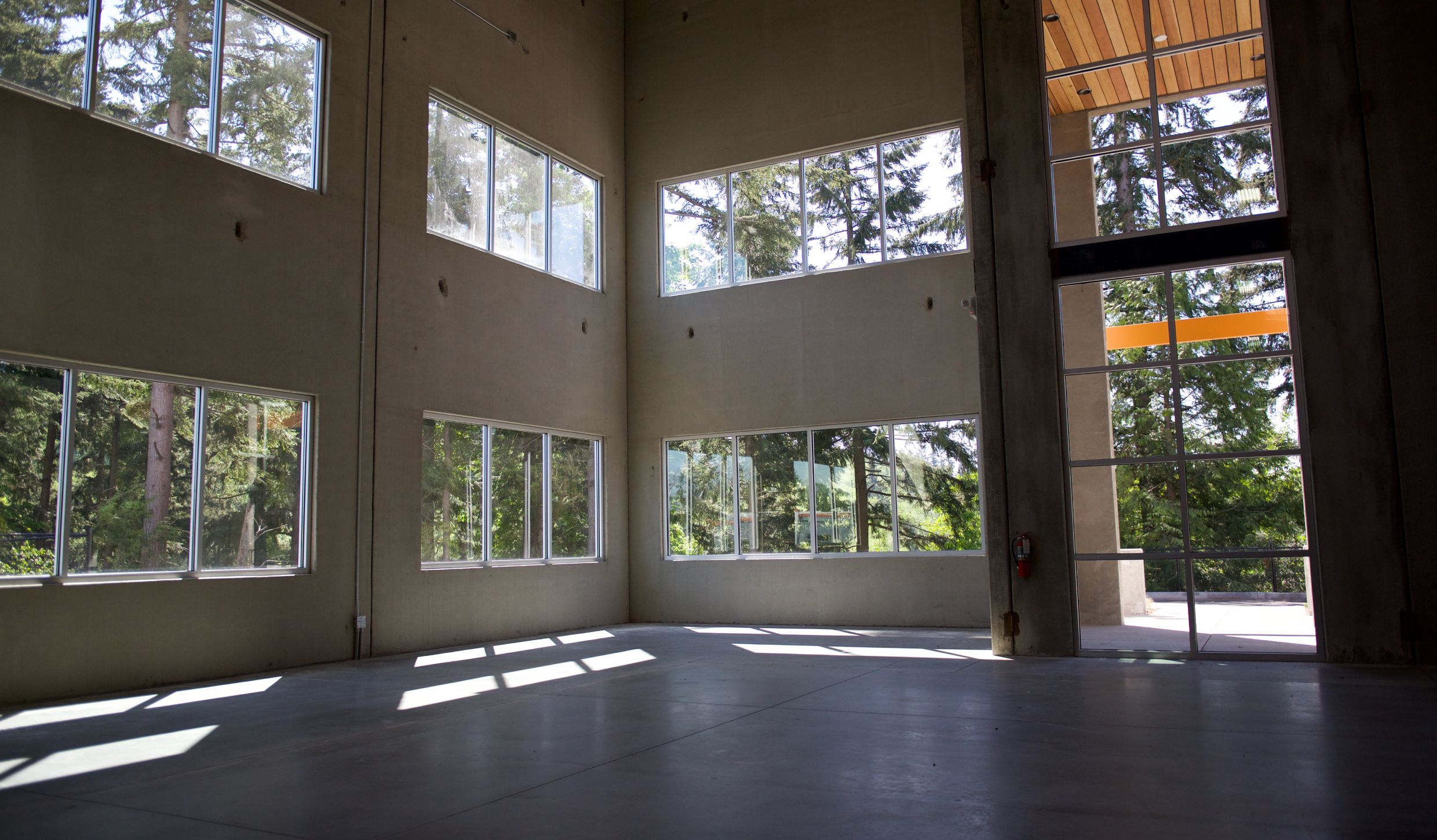 Daylit interior with full-height windows at Seaway West