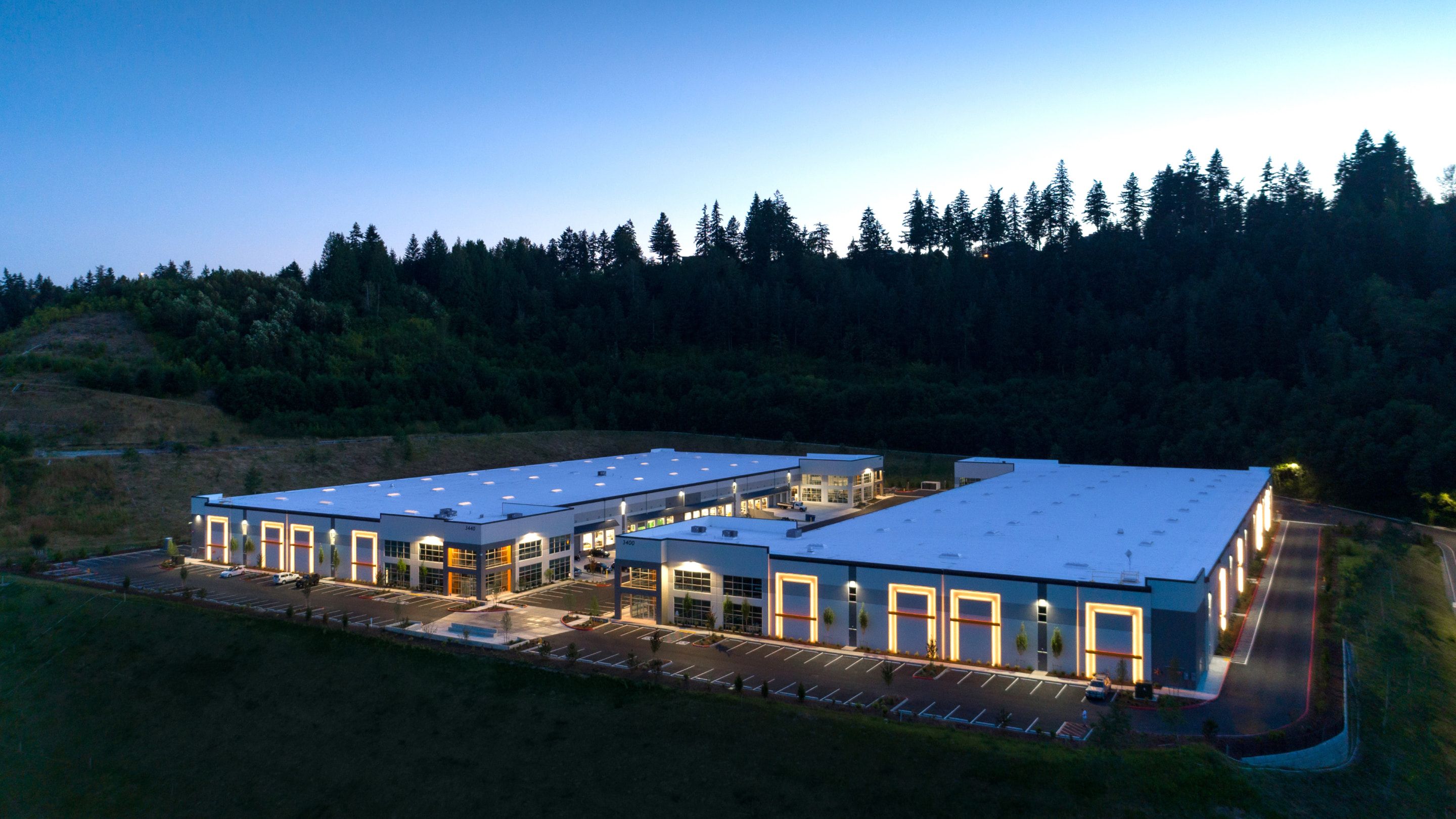 Aerial view of a Bertch Capital industrial development at dusk
