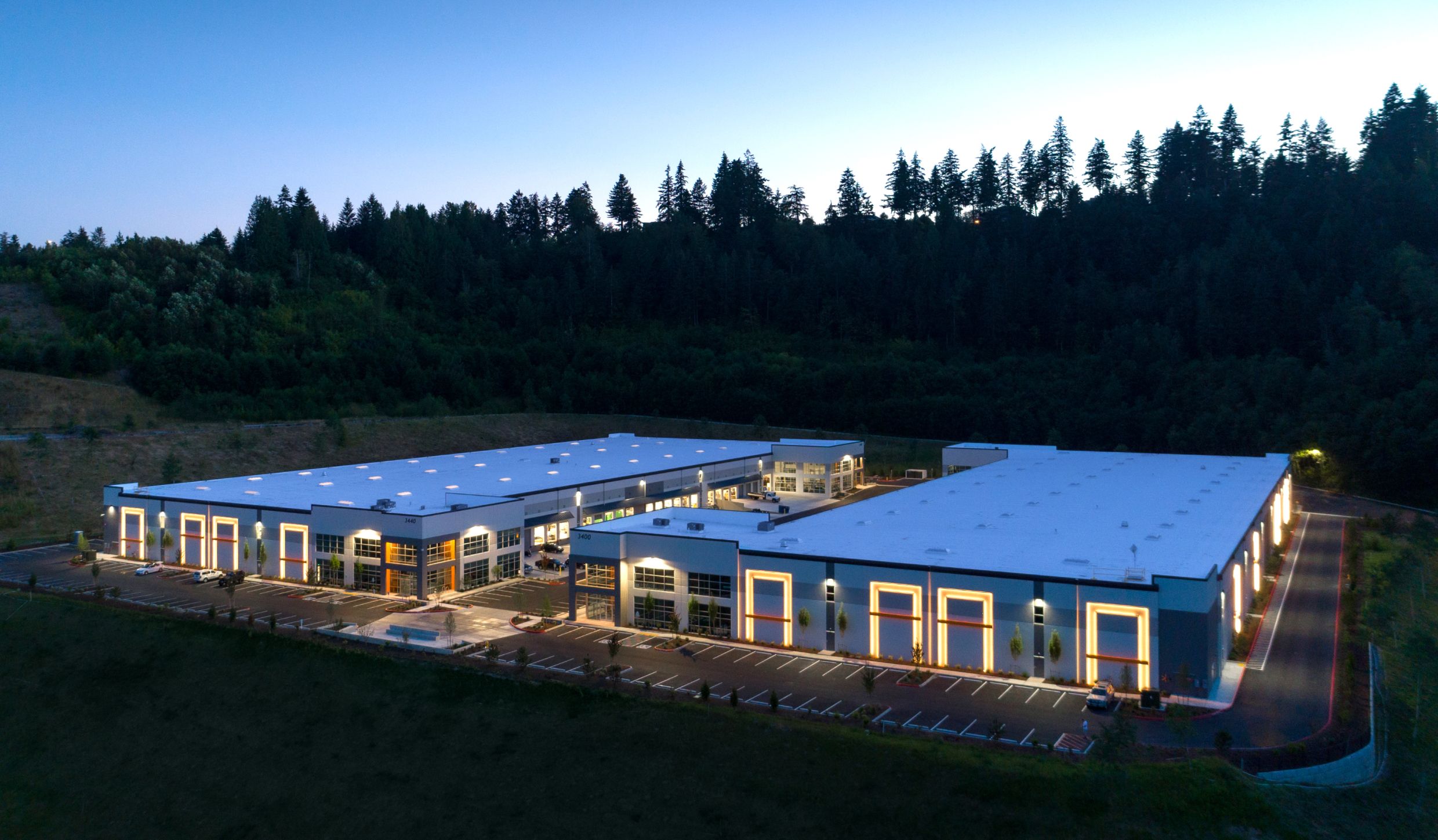 Sumner Ridge warehouse lit at night